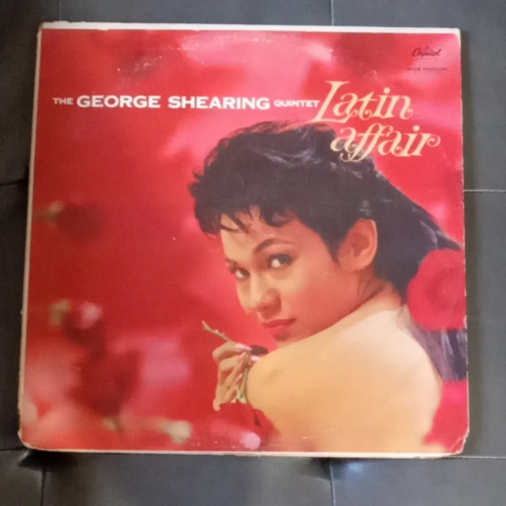 George Sharing Latín Affair - Picture 1 of 3